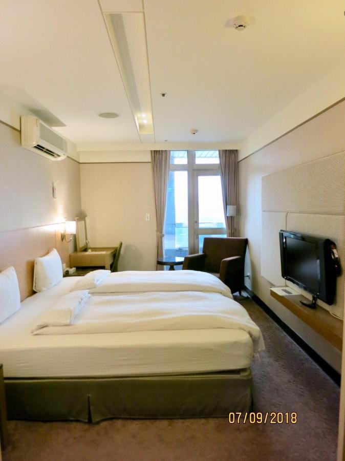Rhine Inn Цзилун Экстерьер фото