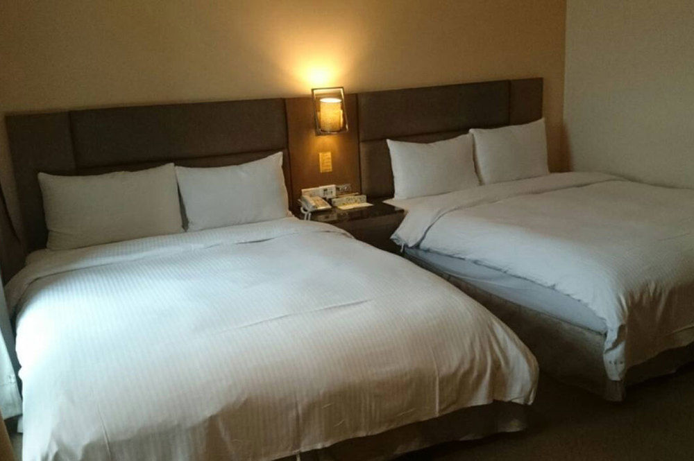 Rhine Inn Цзилун Экстерьер фото