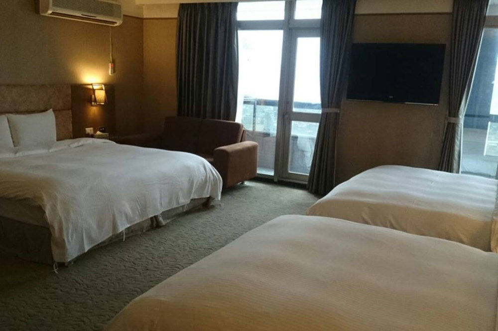 Rhine Inn Цзилун Экстерьер фото